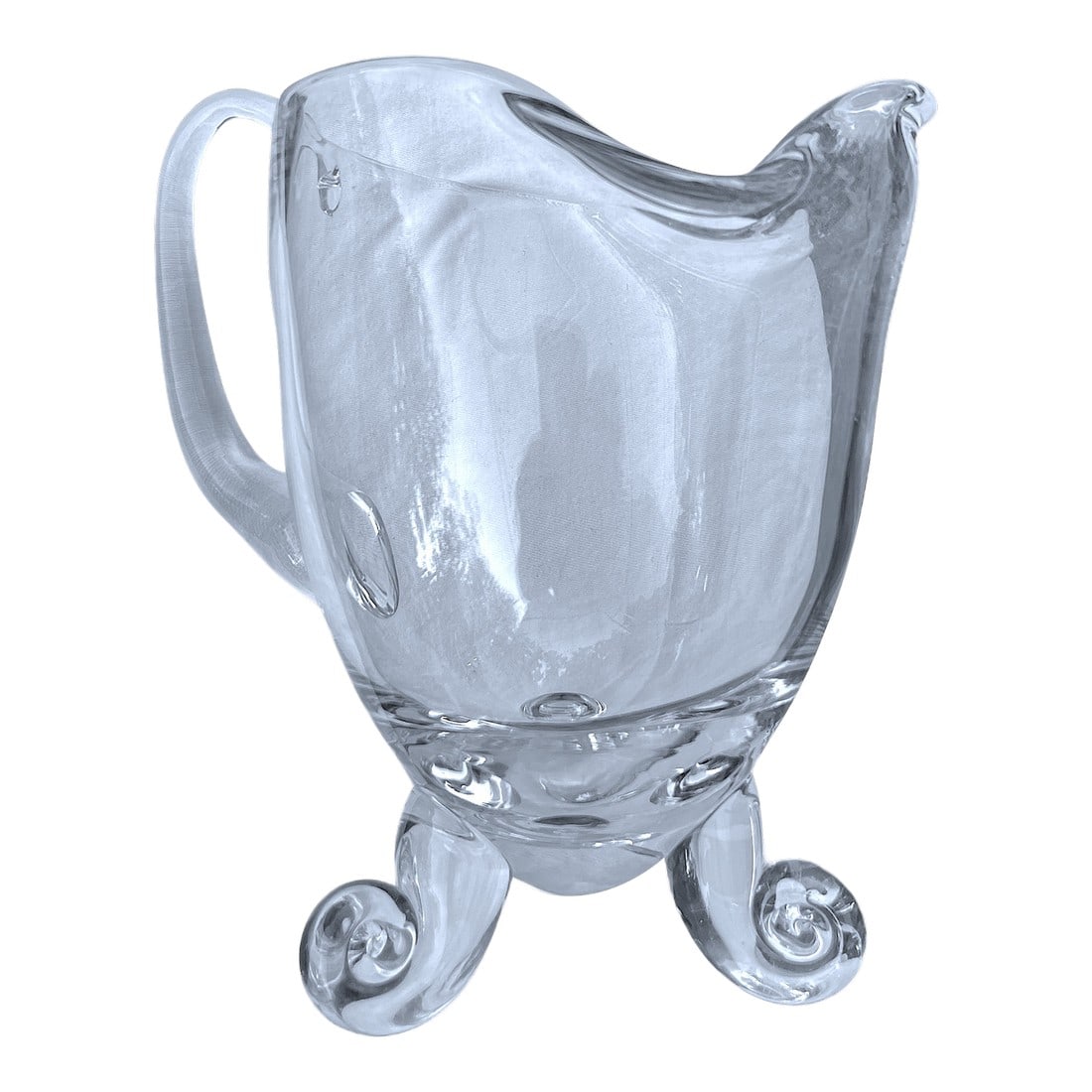 Mouth-Blown Glass Scroll Foot Water Pitcher After Steuben by John Dreves | Hand-Scrolled Feet + Grou: A sculptural, mouth-blown water pitcher inspired by the iconic work of Steuben glass artisan John Dreves, known for his sculptural approach to functional forms. Resting on three dramatic scroll feet