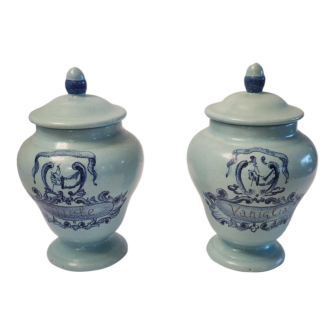 1920s Pair of French Aqua Blue Stoneware Canisters: Rare pair of French stoneware canisters. Miele (honey) and Vanilla. Hand painted. Beautiful Aqua color, in wonderful condition. Condition: Alterations: Original Condition Unaltered Imperfections: Some