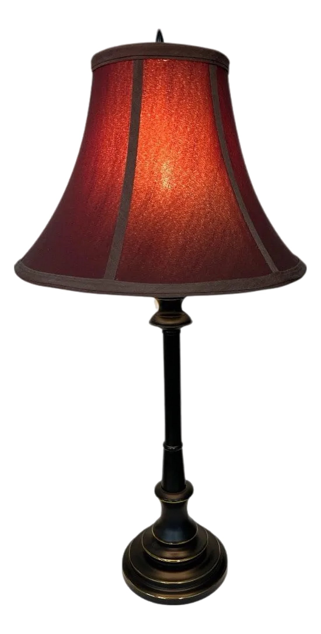 Vintage Stiffel Candlestick Lamp in Bronze Finish: Offering this vintage Stiffel lamp in bronze over brass finish with original shade. The shade is a dark red sits a top a bronze finished candlestick lamp with the brass intentionally showing on the