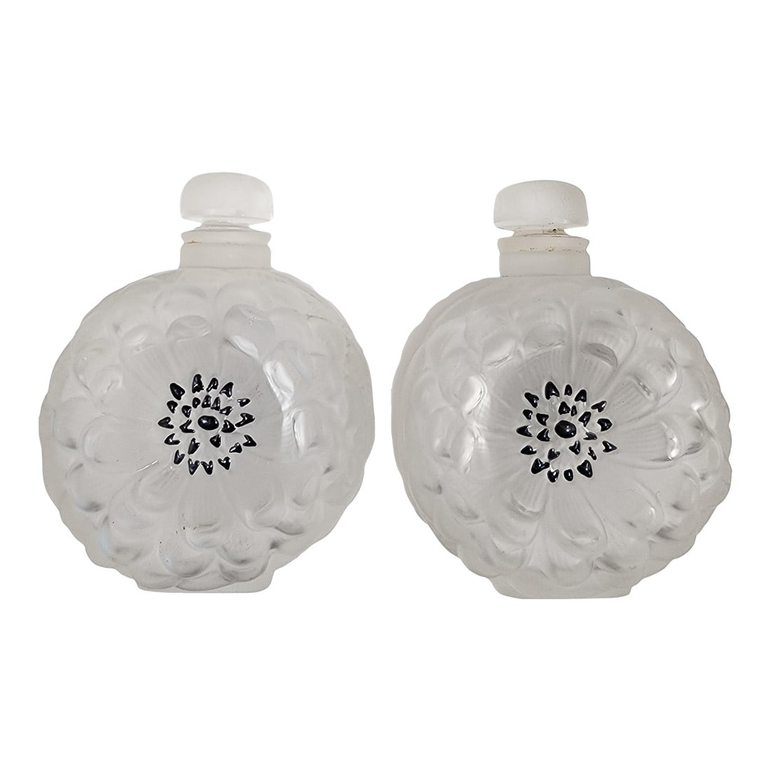 1900s 2 Lalique Dahlia Perfume Bottles: Matching set of Lalique beautiful Dahlias crystal perfume bottles. This set dates back to the early 1900's. The crystal toppers are in beautiful condition with no chips. One bottle has a small chip