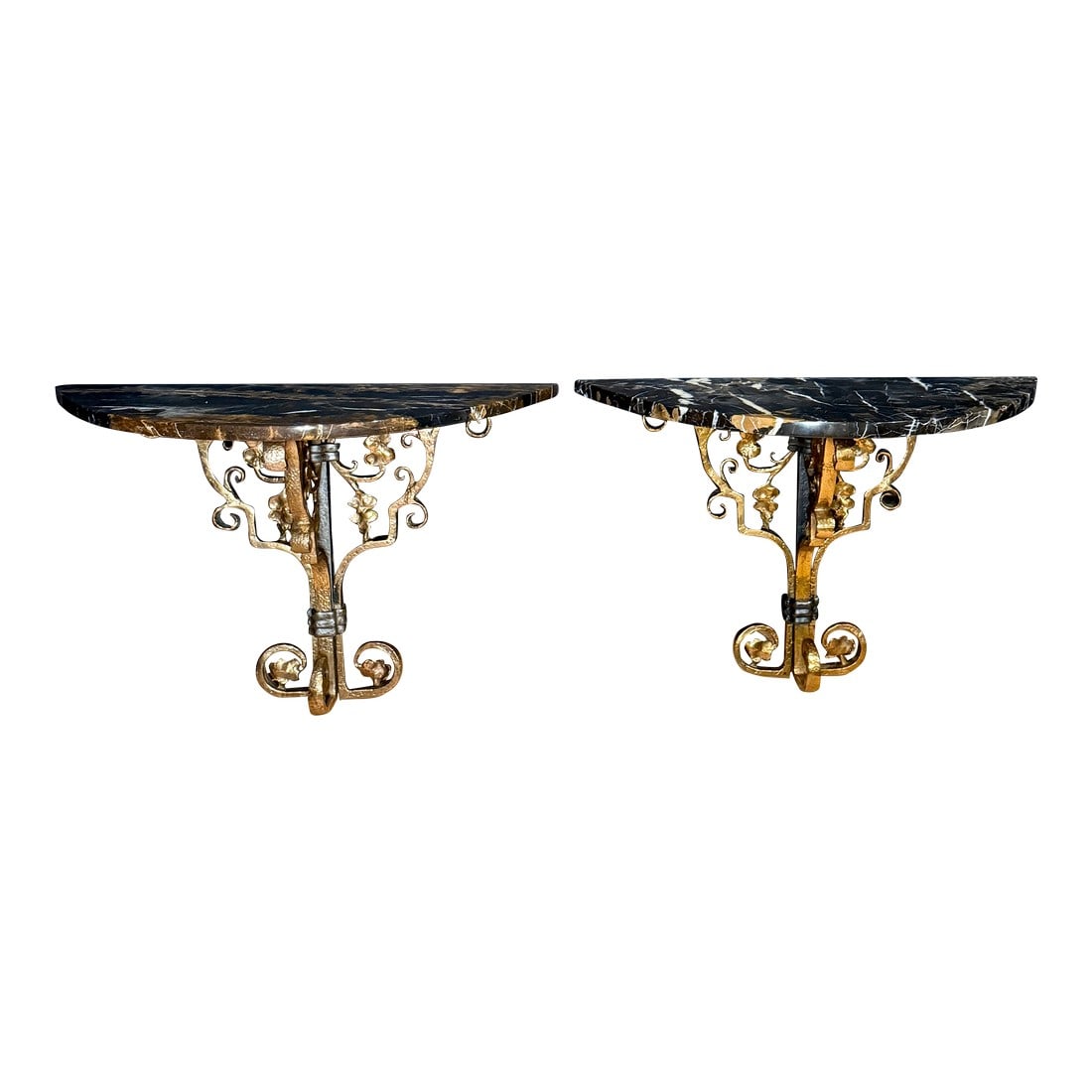 Early 20th Century American Arts & Crafts Bronze and Iron Wall Brackets, Pair: This striking pair of wall-mounted brackets exemplifies the strength, craftsmanship, and material honesty associated with the American Arts & Crafts movement of the early 20th century. Hand forged in