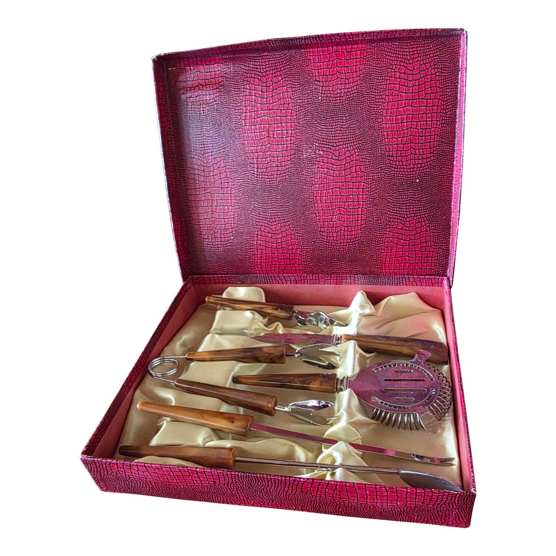 Butterscotch Bakelite Bar Set: Vintage bar tool set....opener. strainer, stirring tools etc. These all have bakelite handles and they are in their original faux reptile skin cardboard box. Condition: Alterations: Original