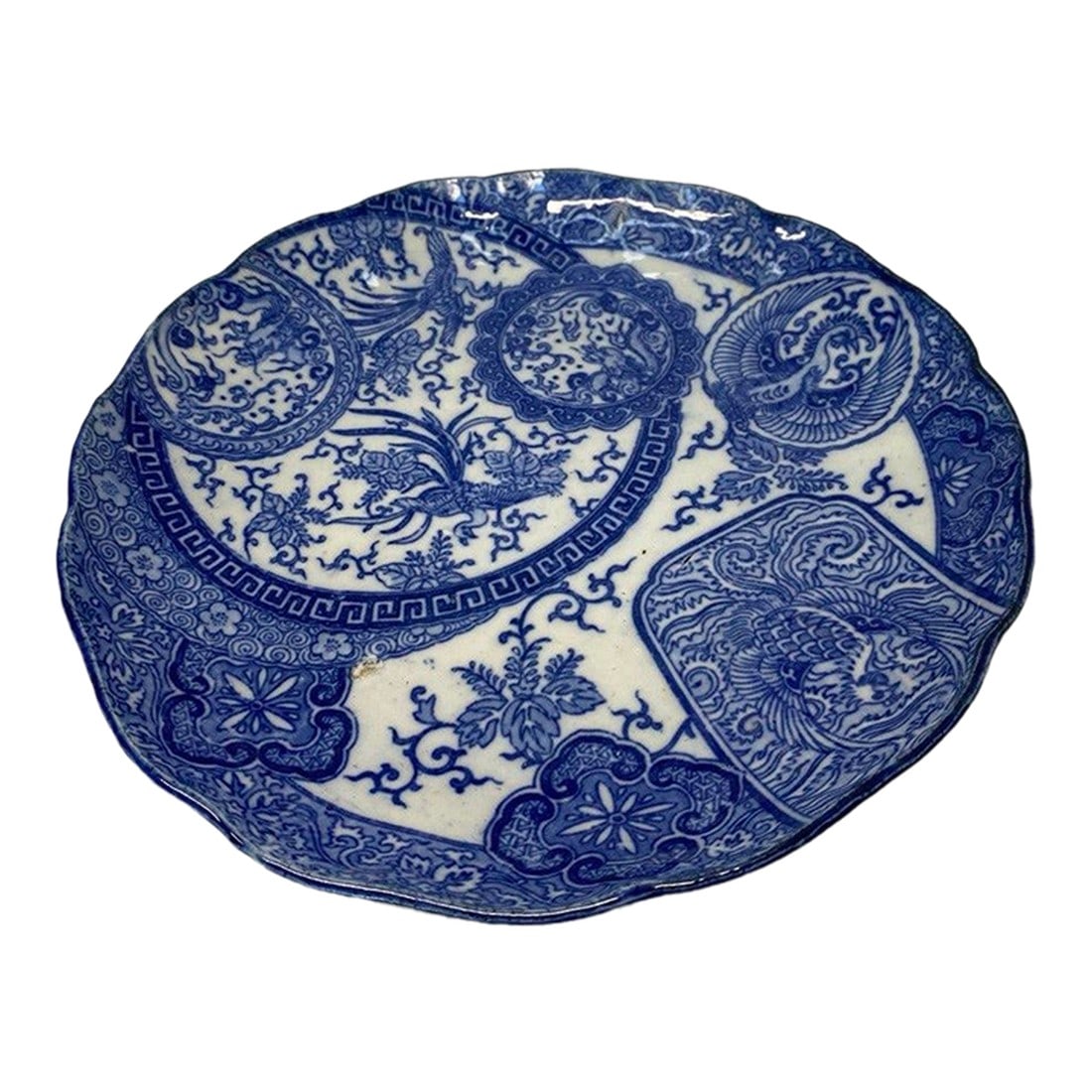 19th Century Chinese Blue & White Organic Scalloped Scholar Plate: There is something quietly sculptural about this piece. A 19th century Chinese blue and white porcelain plate featuring a softly undulating, organic rim "” intentionally irregular, almost