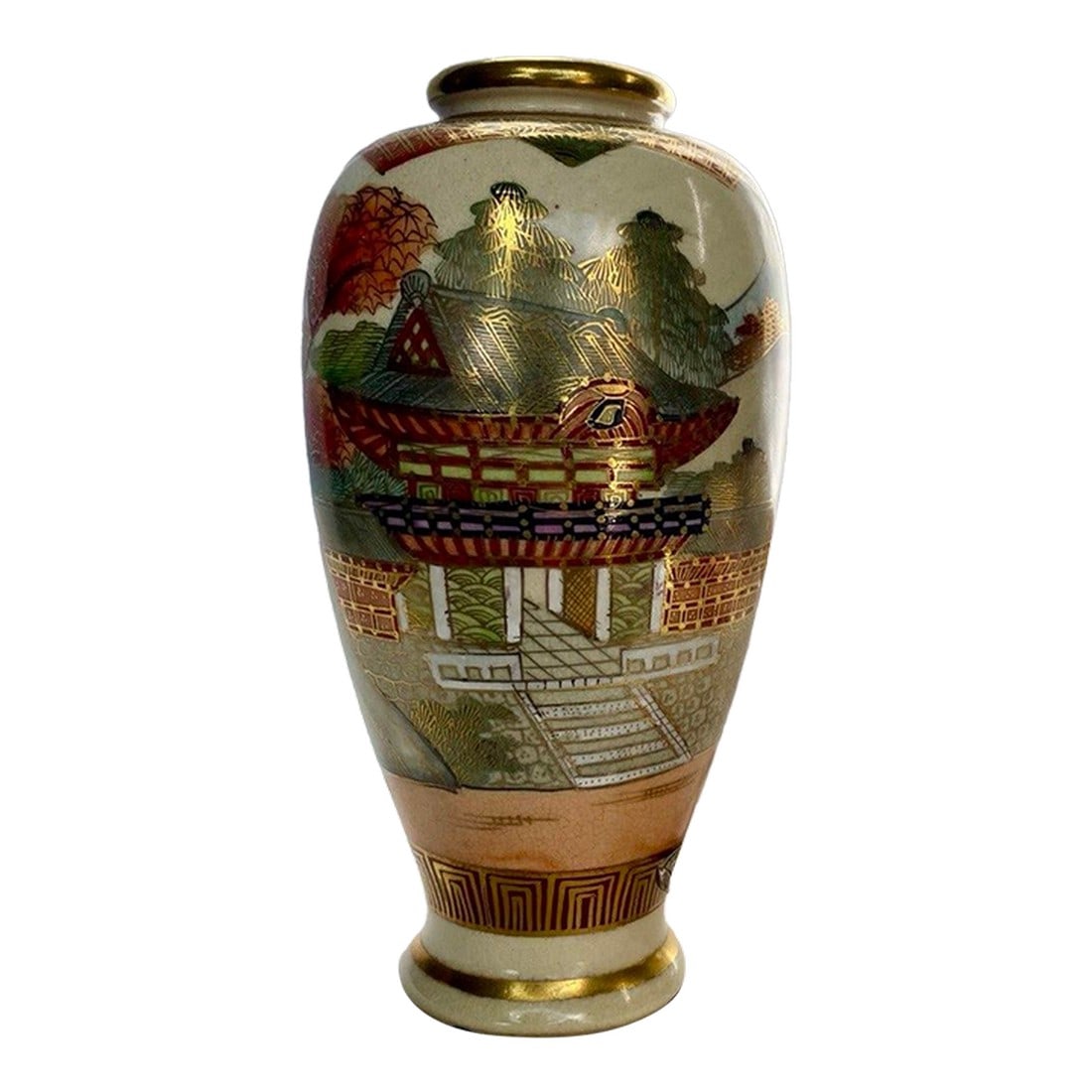 Japanese Satsuma Landscape Vase With Gilt Temple Scene, Late Meiji–TaishÅ Period: This finely painted Japanese Satsuma vase presents a serene landscape composition rendered in soft enamel tones and delicate gilt linework. The scene unfolds across the surface with temple
