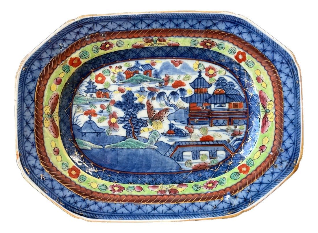 19th C Japanese Imari Porcelain Plater Featuring Pagodas, Moths, and Junk Ships With Historic Staple: A substantial and richly decorated 19th-century Japanese Imari porcelain platter or underplate, dating to the late Edo to early Meiji period (circa 1860–1885), created for export to the Western