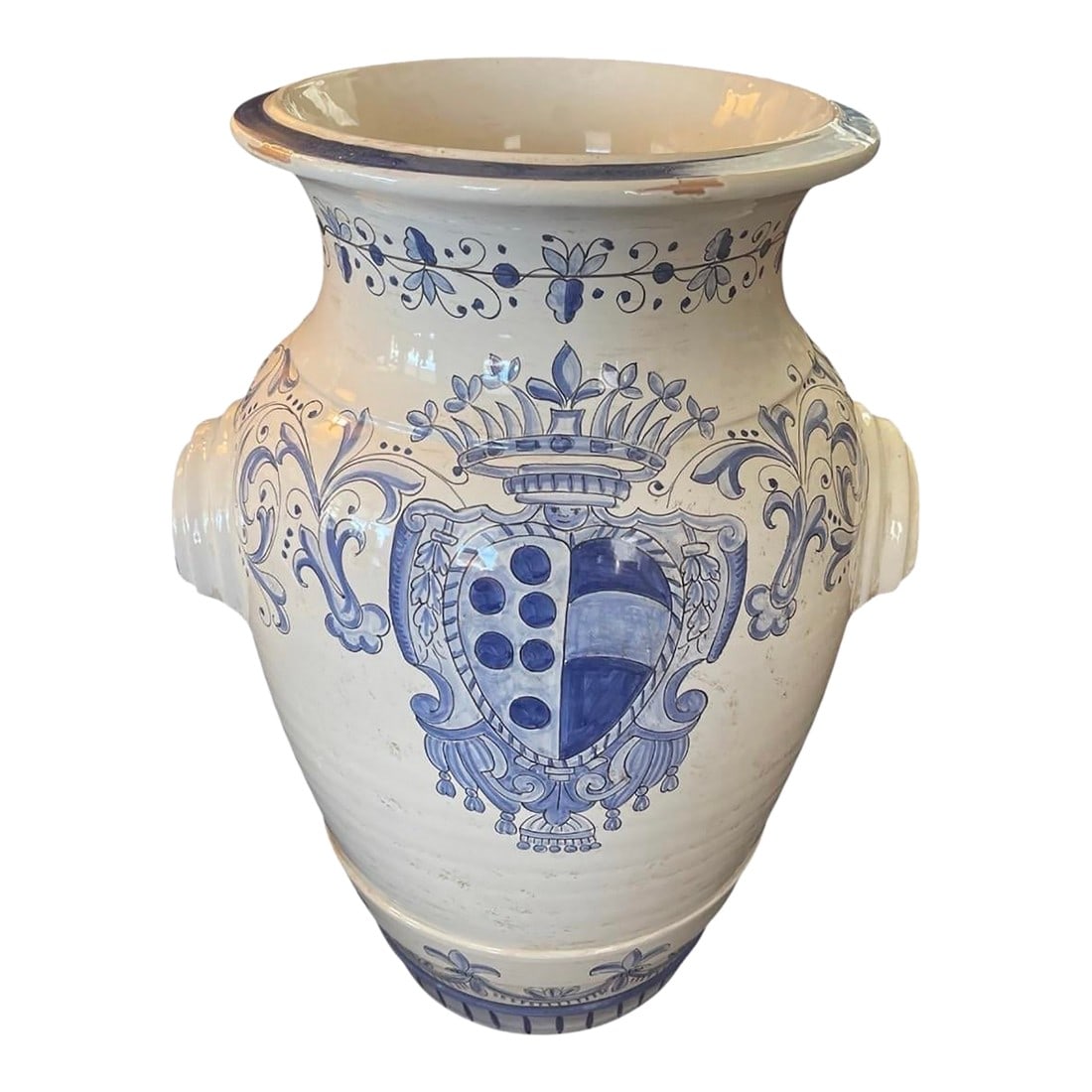 Italian Majolica Medici Crest Vase: An elegant and grandly scaled vintage Italian Majolica ceramic vase, expertly hand-painted in a classic cobalt blue and white palette. This piece features a traditional urn silhouette with a wide,
