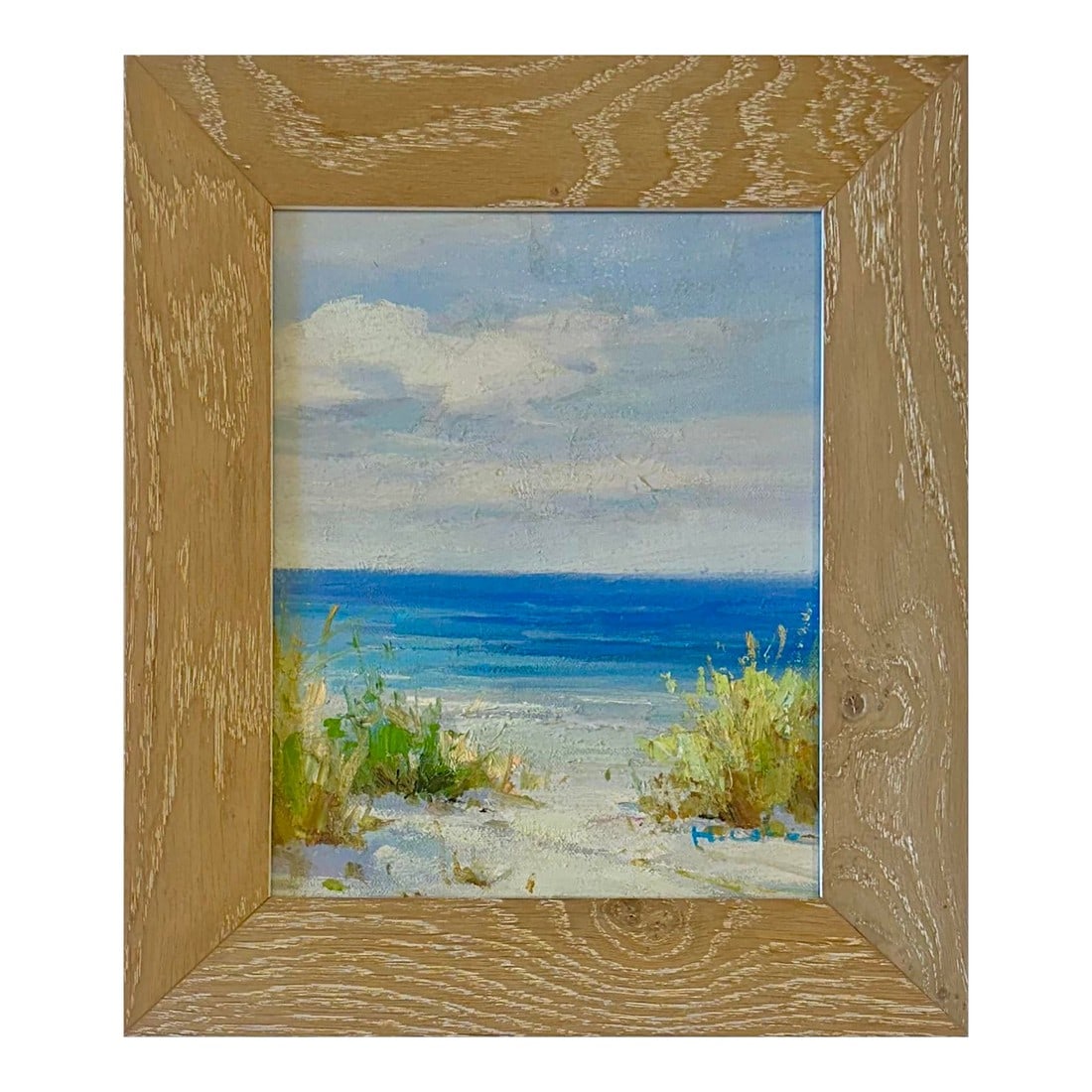Serene Ocean Beach Pathway Scene Oil Painting by H. Cole (Framed): Original oil painting by the artist H. Cole. This beautiful painting captures a tranquil moment with soft waves, lush green grasses, and a peaceful, cloudy sky. Custom framed in a cerused oak inner