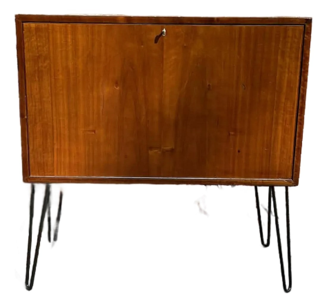 1960s Mid Century Teak Media & Vinyl Record Cabinet: Mid Century Teak Media & Vinyl Record Cabinet On Original Hairpin Legs **Description:** Beautiful Mid Century teak media cabinet, perfect for vinyl record storage and media equipment. Crafted from