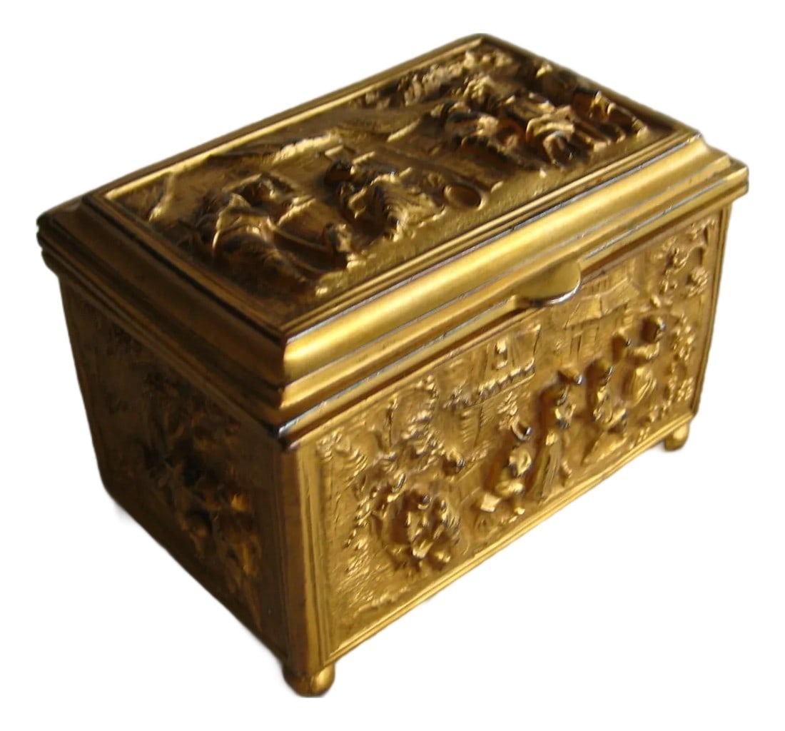 Late 19th Century Gilded Metal Jewelry Box: Jennings brothers company started in the late 18 hundreds and became famous the the quality of their metal work objects , here we have a lovely jewelry box that present a wonderful decor on every