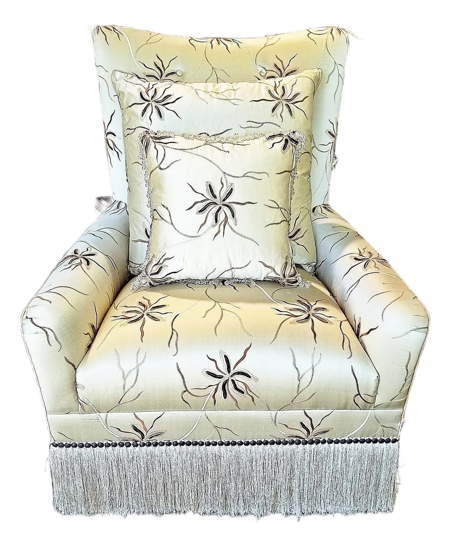 1990s Set of 2 Marge Carson Armchairs: Classic styled fully upholstered and fringe skirted swiveling armchair fit for a king by high-end designer Marge Carson for Robb & Stucky. Raised embroidered fabric in as new condition from a a Vero b