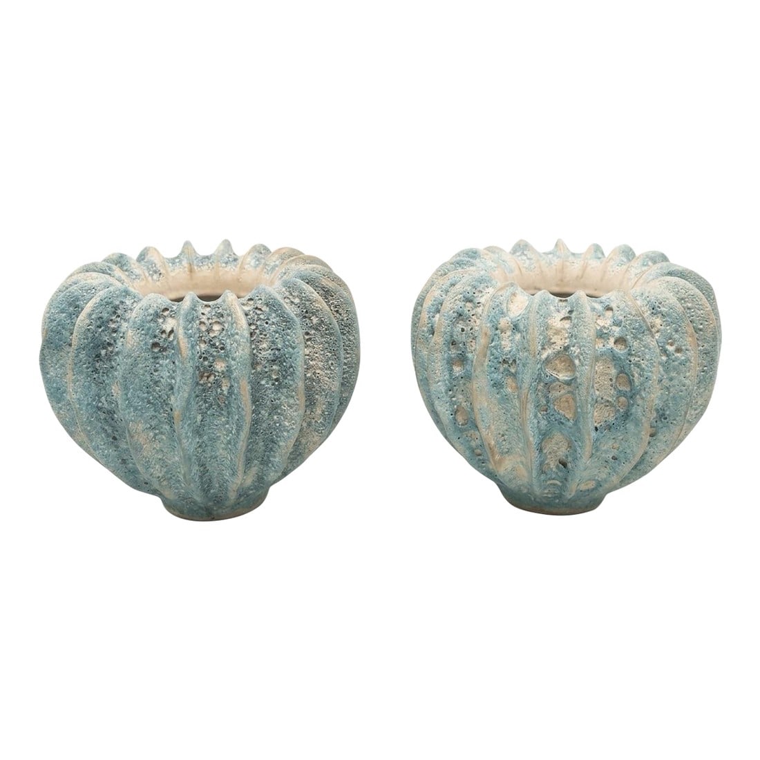 Pair of Italian Artisan Ribbed "Lava" Ceramic Vessels: Elevate your interior with this striking pair of vintage-inspired Italian ceramic vessels. Expertly handcrafted in Italy, these bowls feature a dramatic, deeply ribbed "sea urchin" silhouette that