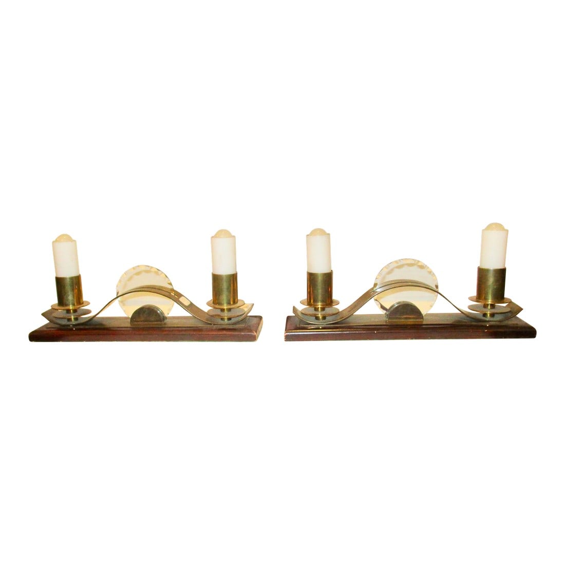 French 1930s Art Deco Shelf Lamps - A Pair of 2: Low Sleek art deco profile with double candlestick shades in milk glass. Lifts off bayonet sockets. Cut brass construction mounted on a stained mahogany base. The electrical system is in very good