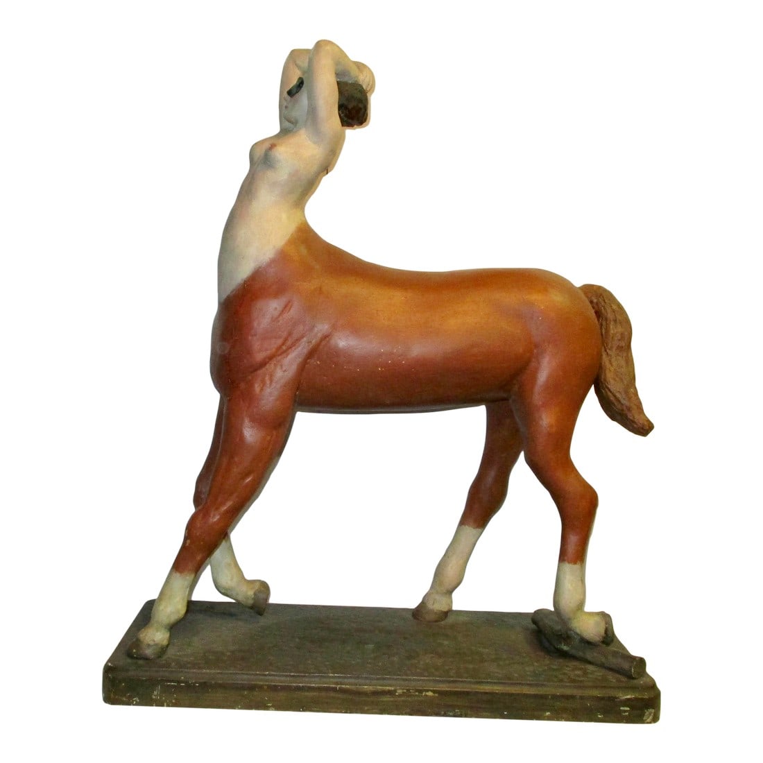 Female Centaur Wood Carving Folk Art: A folk art work of a pretty bold statement, a masked or blindfolded female centaur. Obviously, a mixed message on the female situation, as having beauty, strength, and being blinded to her