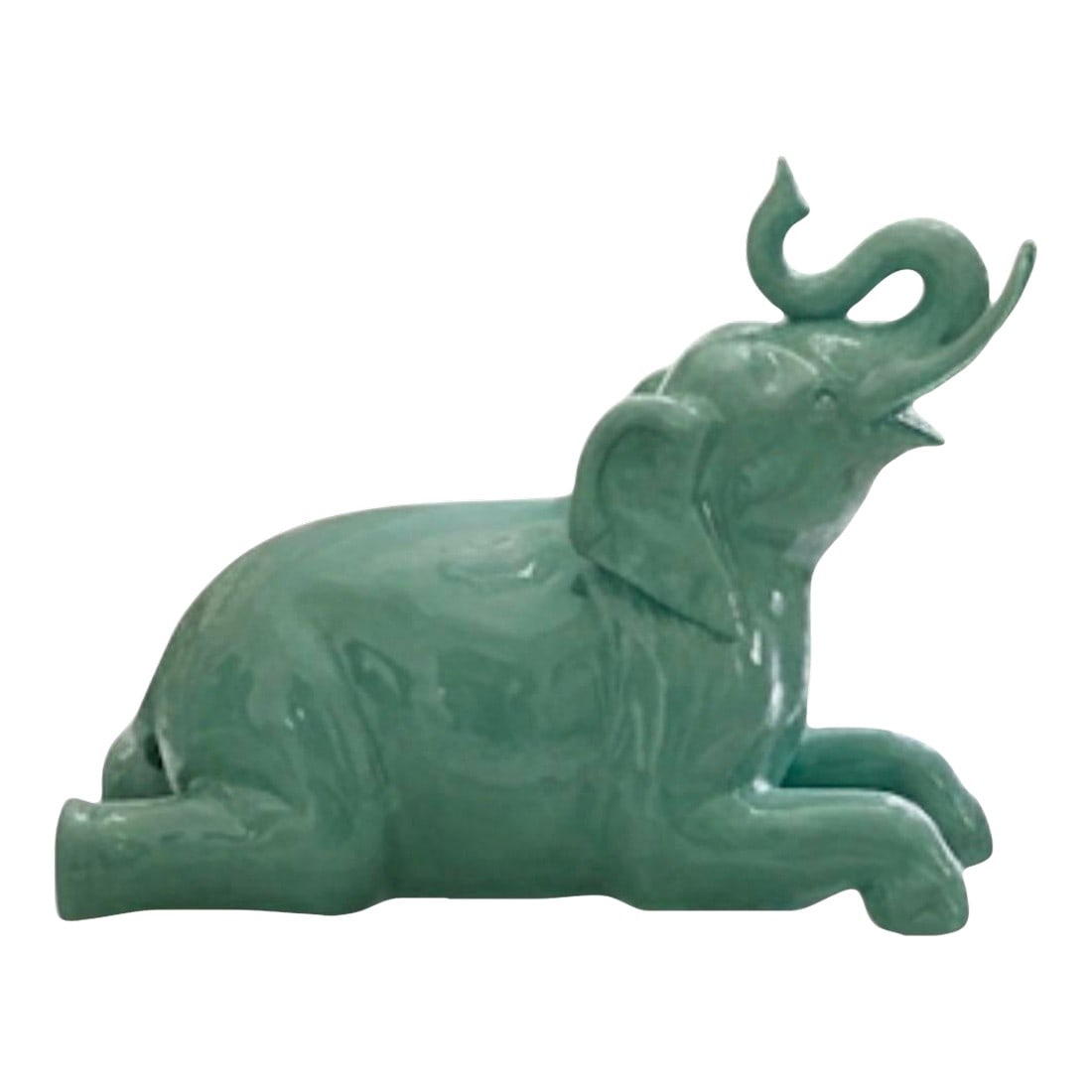 Large Vintage Italian Glazed Celadon Ceramic Reclining Elephant Sculpture: A captivating mid-century vintage Italian glazed ceramic sculpture of a reclining elephant. This substantial piece features a high-gloss celadon green finish that beautifully catches the light,