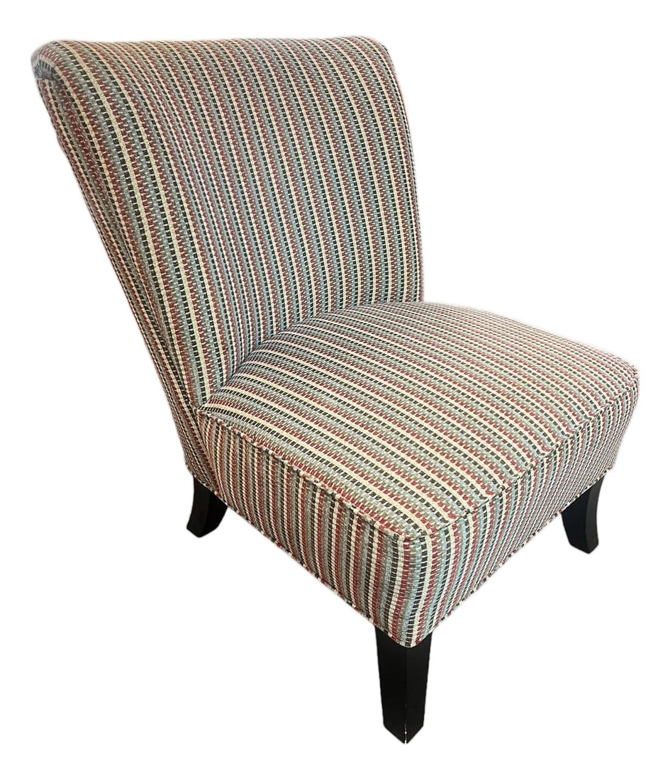 Vintage Classic Large Slipper Club Chair: Large slipper chair by H.M.Richards made in the USA Fabric is multicolor featuring tan, dark, brown blue, green and red Chair has black painted legs Condition: Alterations: Original Condition Unaltere