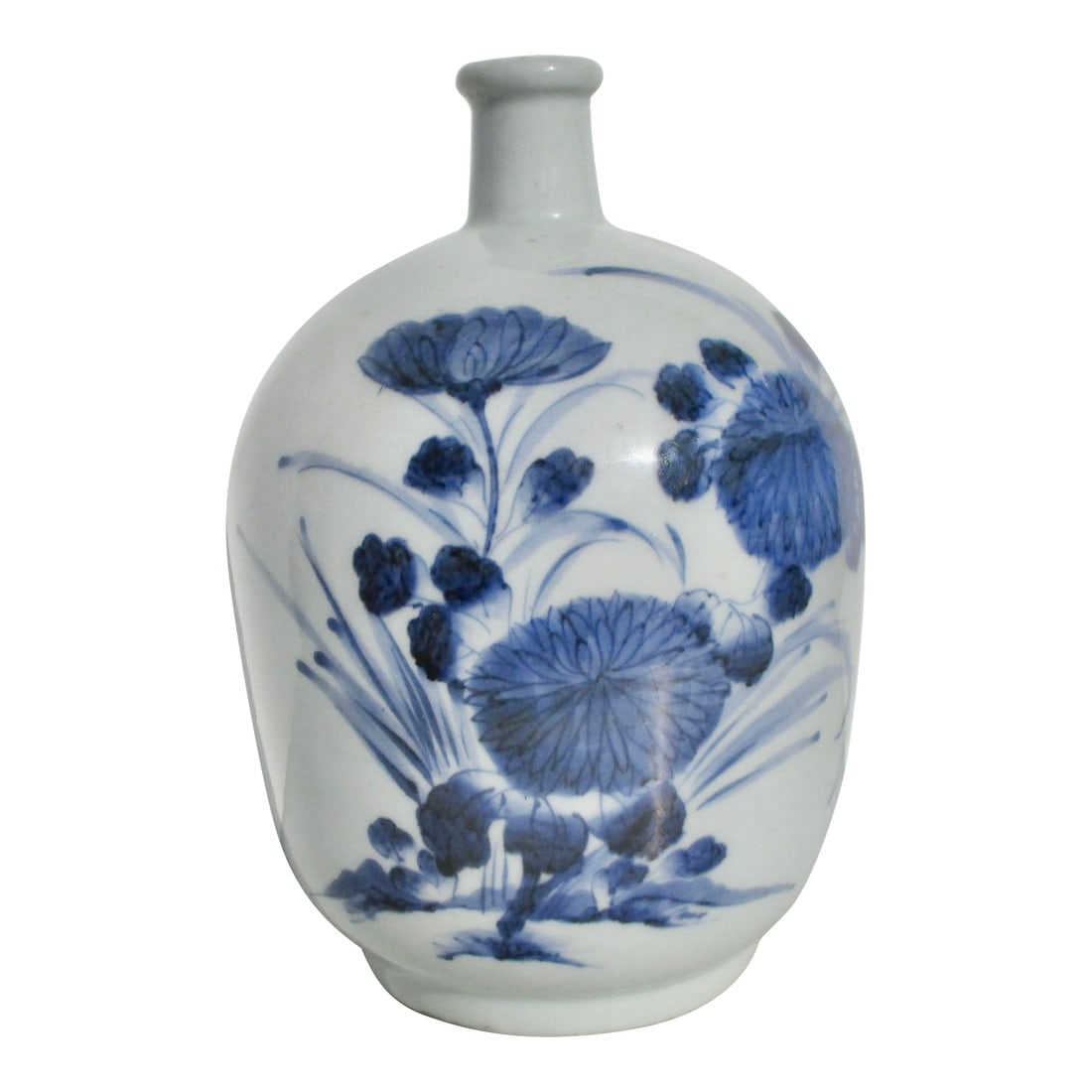 Japanese Saka Wine Bottle Early 20th Century: Celadon body with an ink blue floral spray across the front and a pair of butterflies in flight on the back side. A splendid handthrown bottle for beer or sake from Japan. The soft blue celadon body