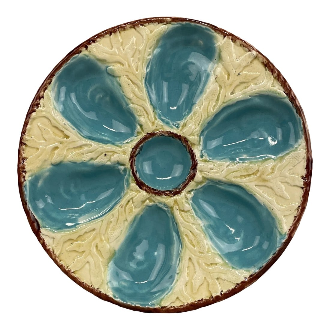 19th C English Oyster Plate With Six-Well Majolica Glazed Oyster Plate by Fielding & Co. Ltd: A 19th c English Oyster Plate with six-well majolica glazed oyster plate by Fielding & Co. Ltd., Stoke-on-Trent, England, circa 1875-1880.. Turquoise oyster wells surround a center well. A chocolate