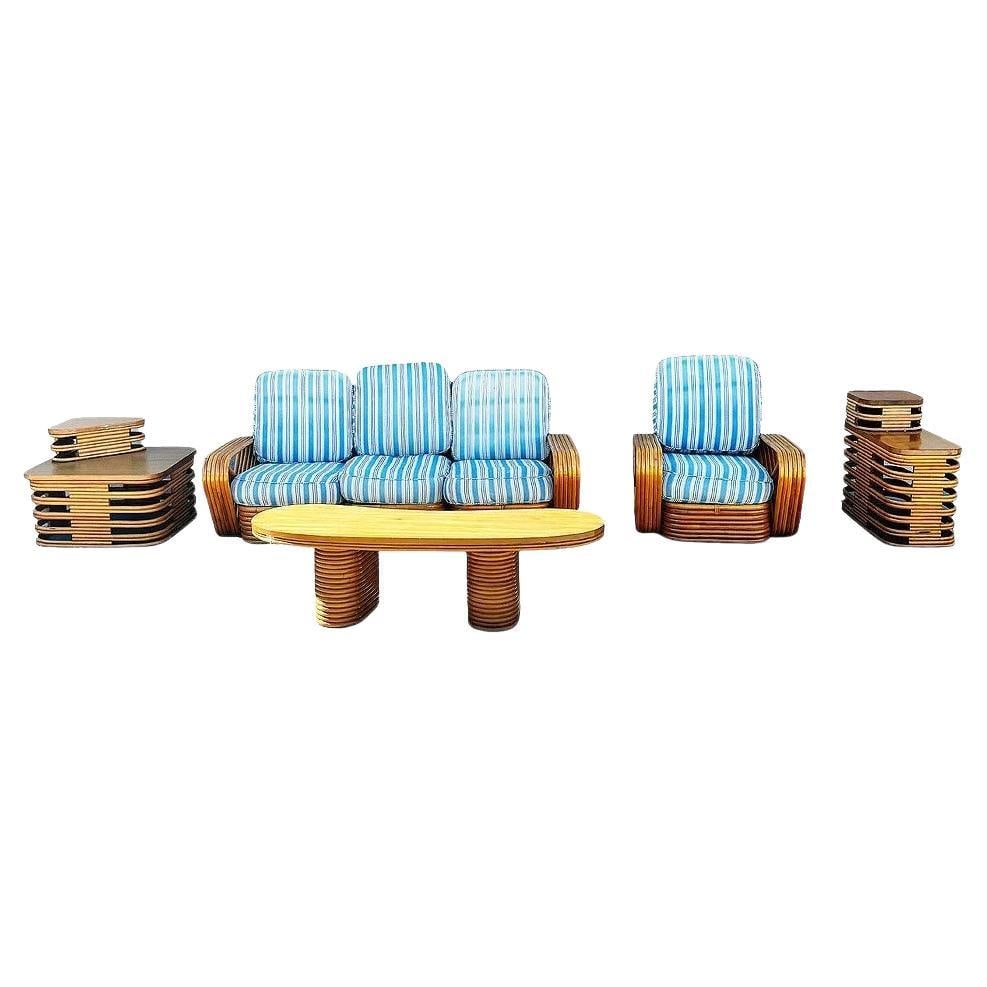 Restored MCM Rattan Six Strand Square Pretzel Table & Seating Livingroom Set: Title: Restored MCM Rattan Six Strand Square Pretzel Table & Seating Livingroom Set Description: This beautifully restored living room set features a classic Paul Frankl-inspired mid-century design