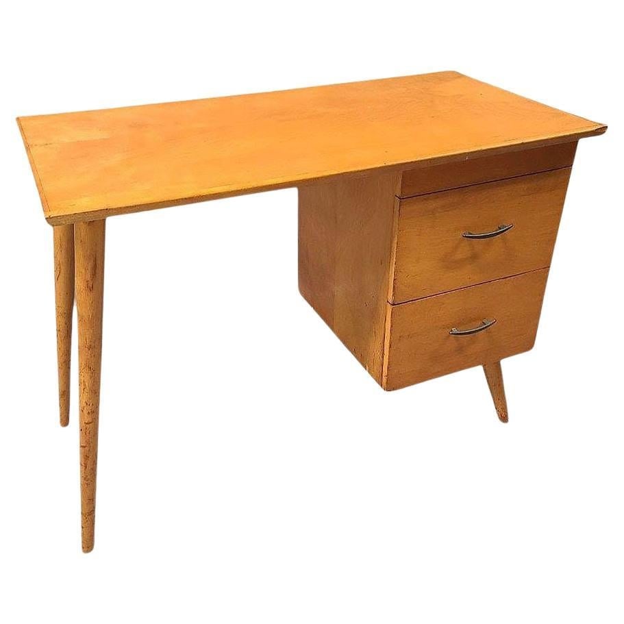Mid-century Blond Maple Desk by Paul McCobb "Planner Group" for Winchendon: Title: Mid-century Blond Maple Desk by Paul McCobb "Planner Group" for Winchendon Description: Late Mid-century solid maple pedestal desk featuring 2 tapered legs and 2 pull-out drawers on the right s