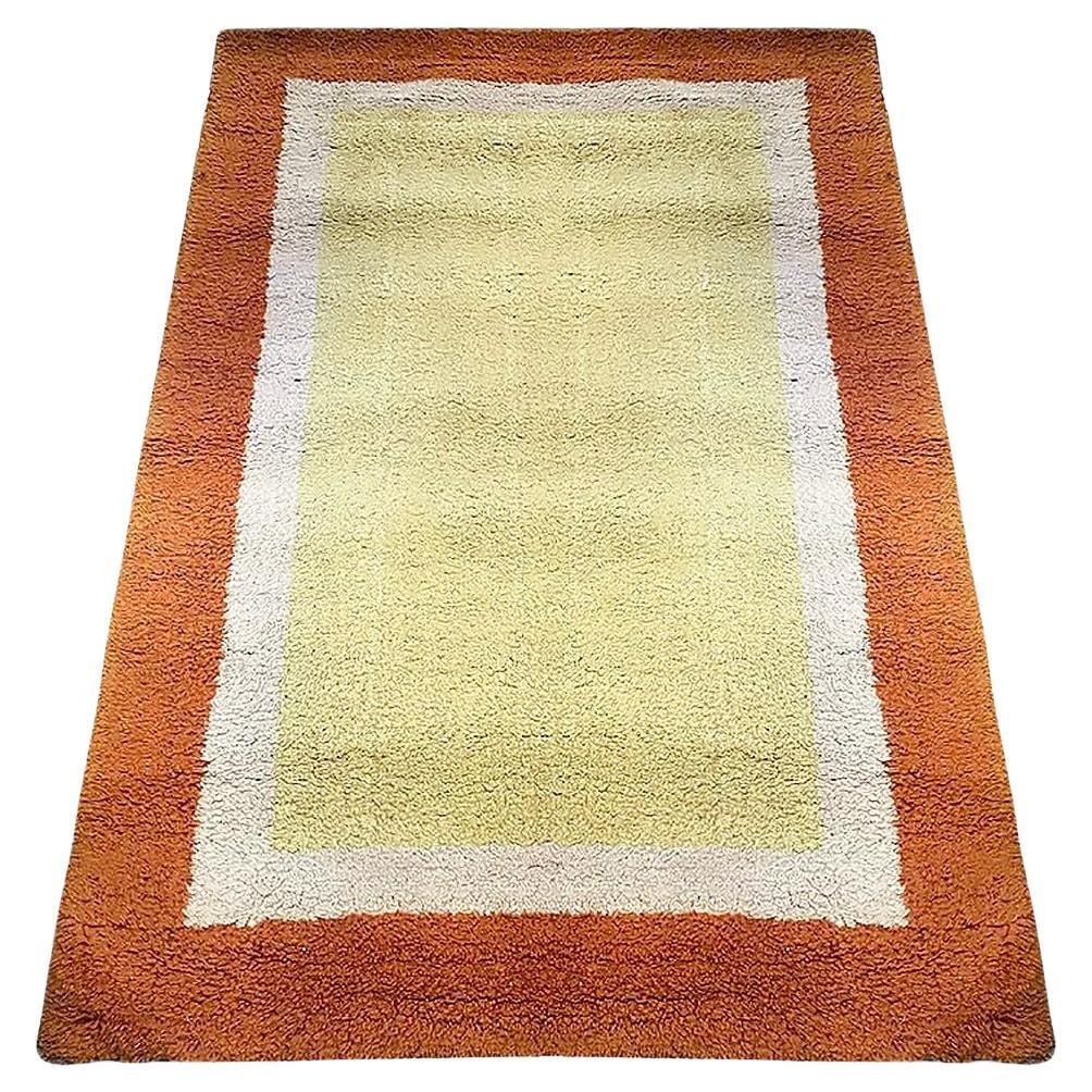 Post Modern Geometric Tricolor Scandinavian Shag Wool Rug: Title: Post Modern Geometric Tricolor Scandinavian Shag Wool Rug Description: Postmodern area shag area wool featuring 3 rectangle patterns, featuring orange, yellow, and which step inward. It is an e