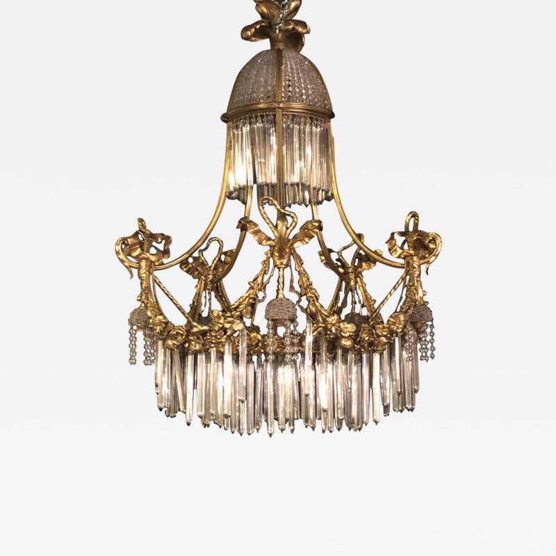 Louis XVI Style Russian Neoclassical Doré Bronze and Crystal Chandelier: Title: Louis XVI Style Russian Neoclassical Doré Bronze and Crystal Chandelier Description: Description 1: A Louis XVI style doré bronze and crystal balloon form chandelier. The finely chase