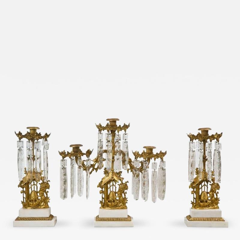 Set of Three French Belle Époque Style Candelabras: Title: Set of Three French Belle Époque Style Candelabras Description: Description 1: Set of three French Belle Époque style gilt-metal candelabras, the center piece has three arms, the