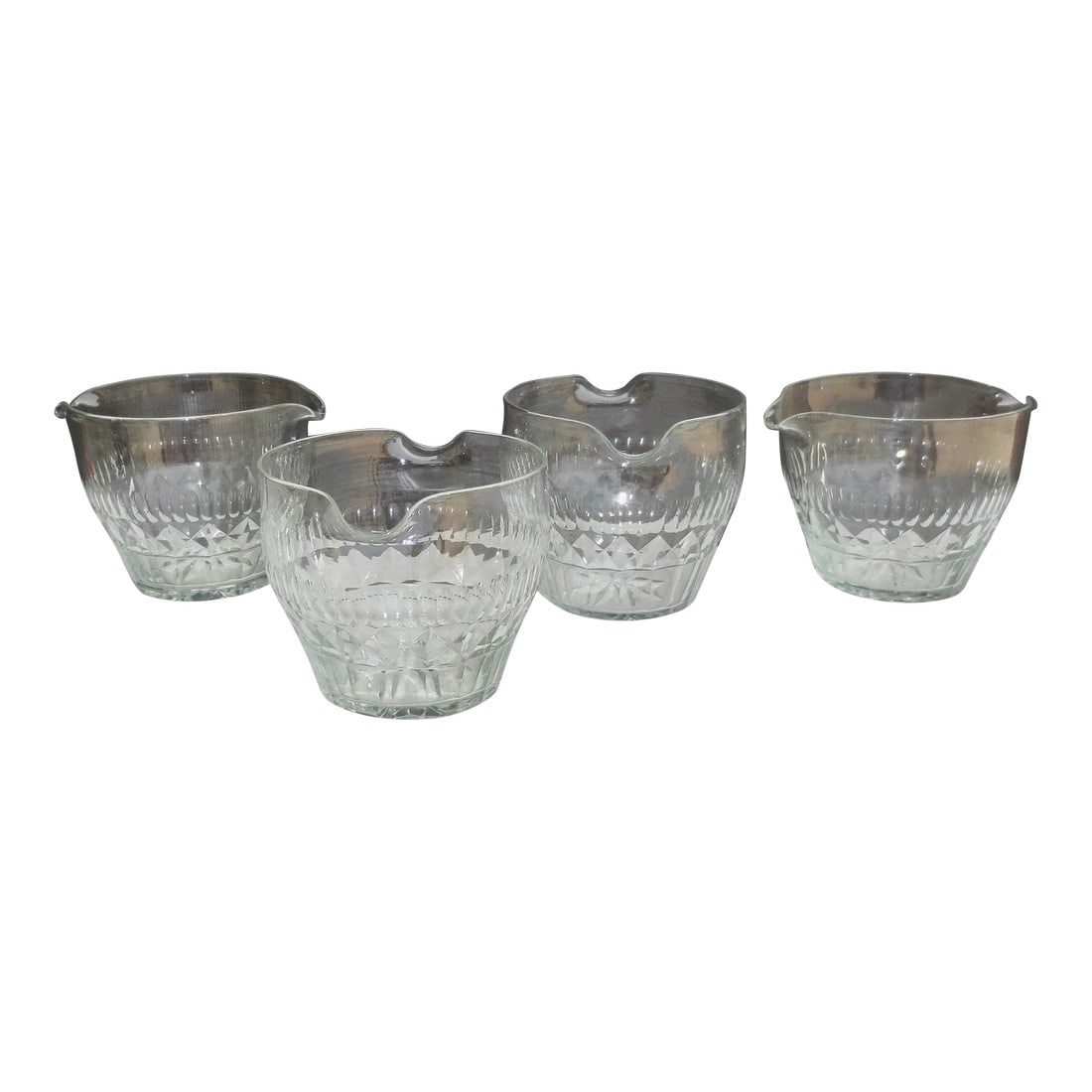 Four 18th Century Irish Cut Glass Wine Rinsers - Set of 4: Set of 4 Irish wine rinsers, Slab cut panels, with three bands of various cut patterns. Double spouts and star-cut bottoms. Various inclusions and bubbles in the glass walls, see detailed photos. The