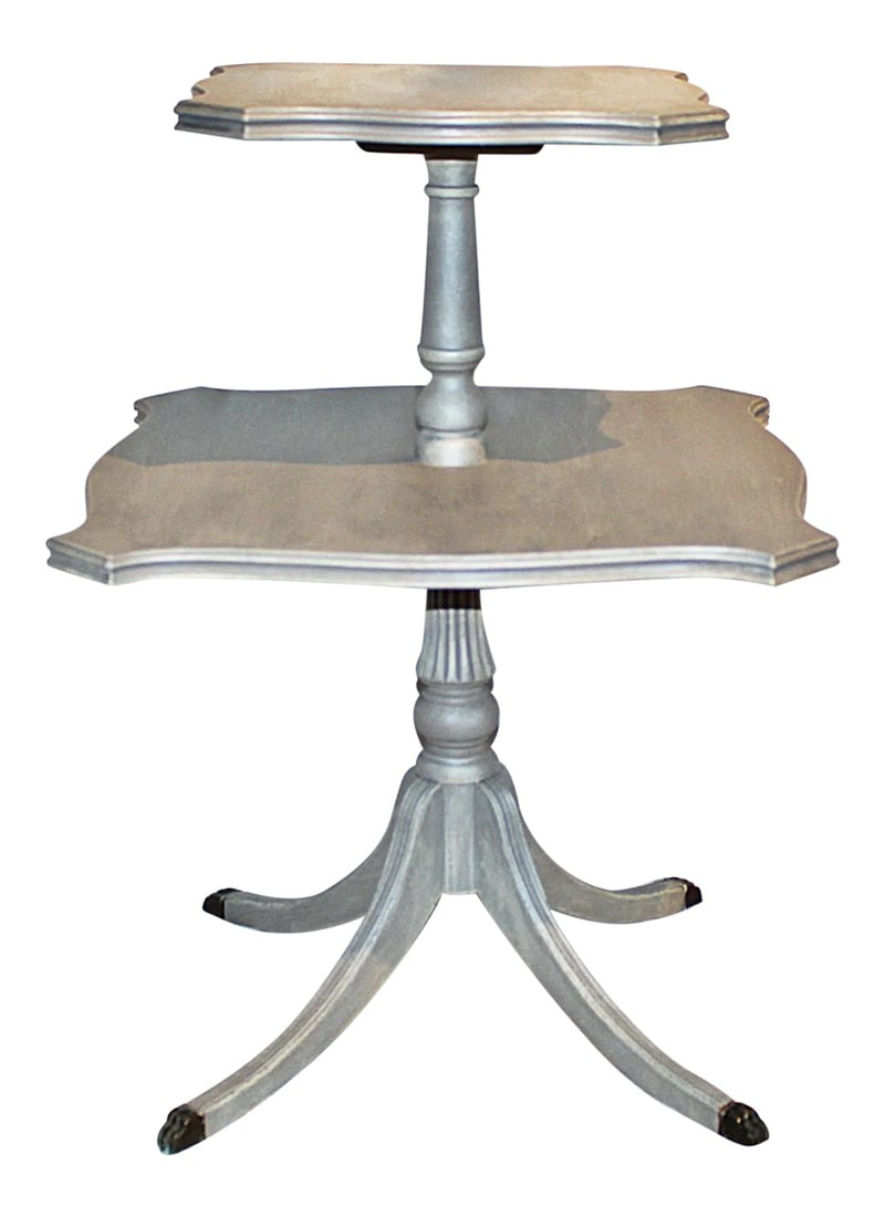 1940s Patined 2-Tier Table: Unusual and rare shaped 1940s solid mahogany 2 tier tea table just finished in Annie Sloan paint, multi-layered silver wax technique, brass lion feet. Will remove legs for UPS shipping. Condition: