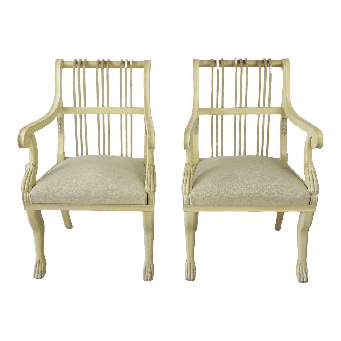 A Pair of Chairs in the 20th-Century With Animal Feet: a pair of chairs in the 20th-century Michael Taylor style This is a lovely pair of vintage chairs. The chair's wood's simple lines and the light stain make this chair stand out. The seat of the chair 
