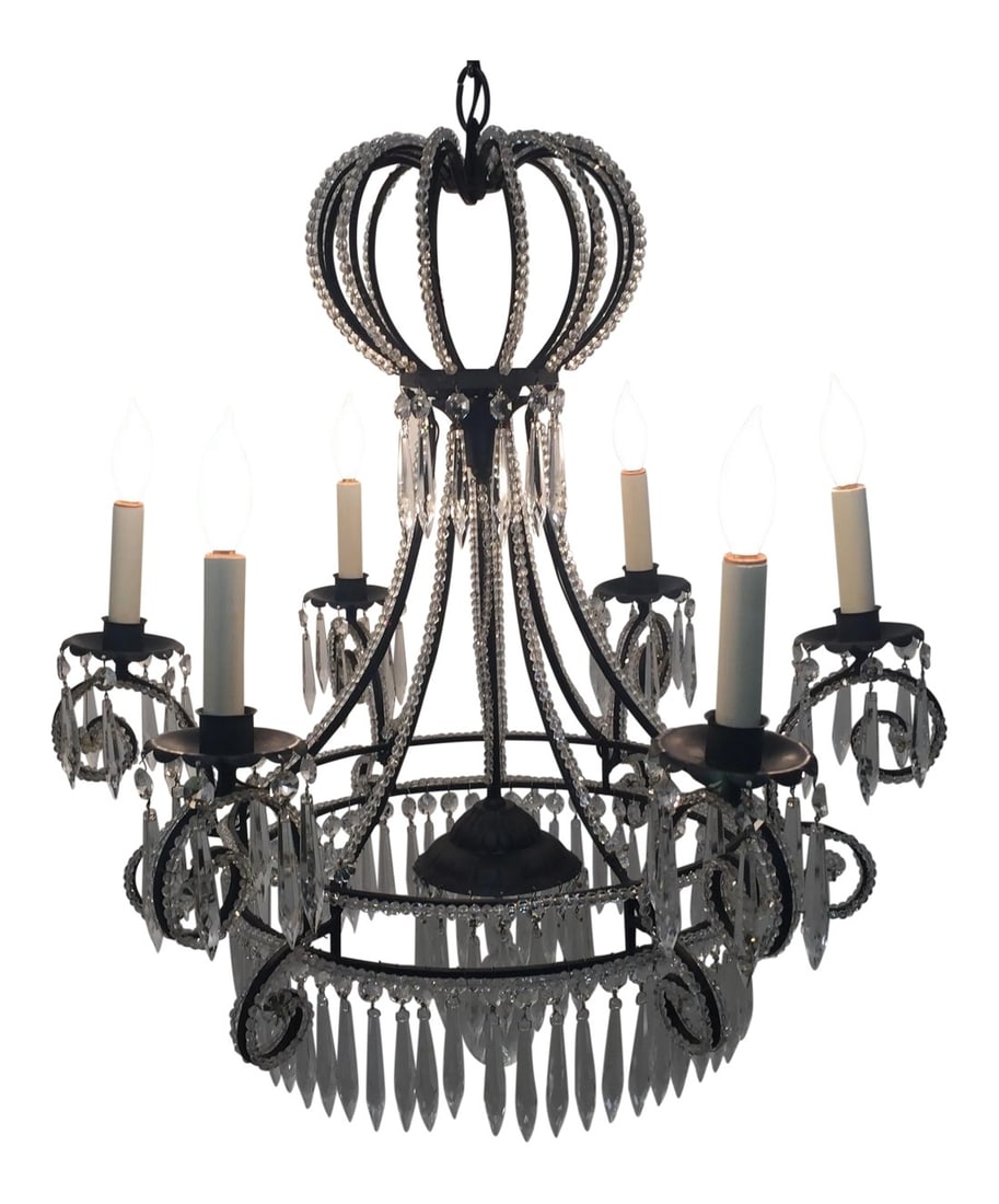 Vintage French Iron and Crystal Chandelier: Wonderfully shaped French chandelier having black metal frame adorned with crystal beading, a crown-shaped top, 6 arms, and artful placement of dripping crystals. Condition: Alterations: Original Cond