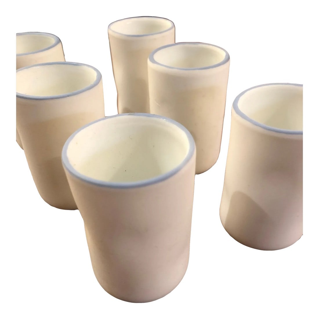 Piet Stockmans Handmade Belgian Pottery Shot Glasses- Set of 6: Beautiful Belgian handmade pottery white matte finish shot glasses with light blue border by artist Piet Stockmans. Condition: Alterations: Original Condition Unaltered Imperfections: Some