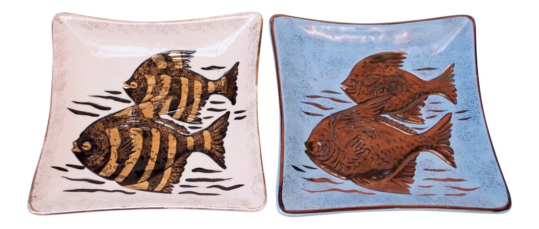 Vintage Japanese Ceramic Fish Dishes by Lefton - a Pair: Pair of circa 1950s Japanese ceramic fish dishes by Lefton in blue and and white. Decoration on the white dish is a high black and gold glaze (almost metallic), and the detail on the blue dish is