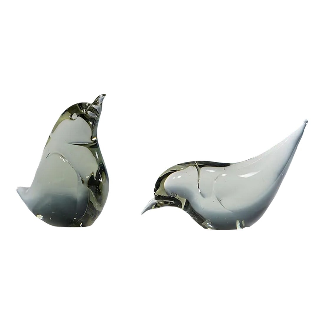 Pair of Art Glass Birds Designed by Livio Seguso Ca. 1970s: Pair of Art Glass Birds Designed by Livio Seguso ca. 1970s A pair stylized art glass sculptures of little birds in smoke grey glass. They are hand made in the Graal glass manufactory, Germany. Designe