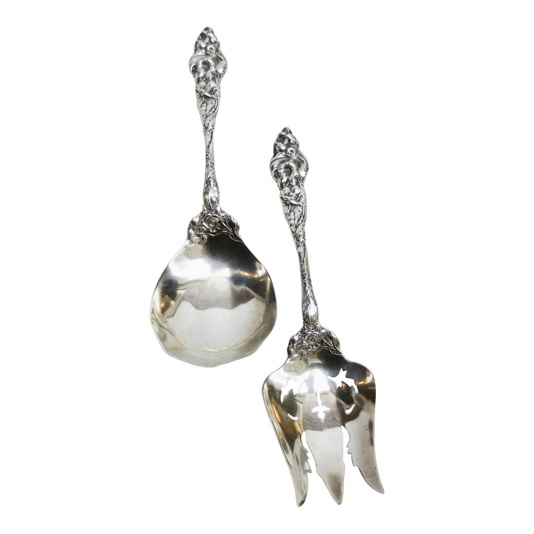 Vintage Sterling Silver Art Nouveau Serving Set -A Pair of 2: Art Nouveau sterling serving set. Large carved floral handles with clusters of booming flowers on the front and back. Marked sterling to the back. Pierced bowls in the fork to allow draining of sauces