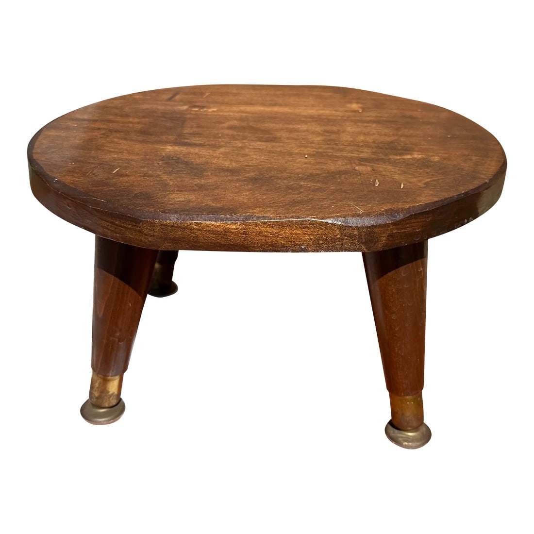 1970s Petite Brown Wooden Stool: Up for consideration is a beautiful brown wooden stool. This would look lovely in your home and it is a great find for the interior design enthusiasts. Please check out my other listings! Condition: