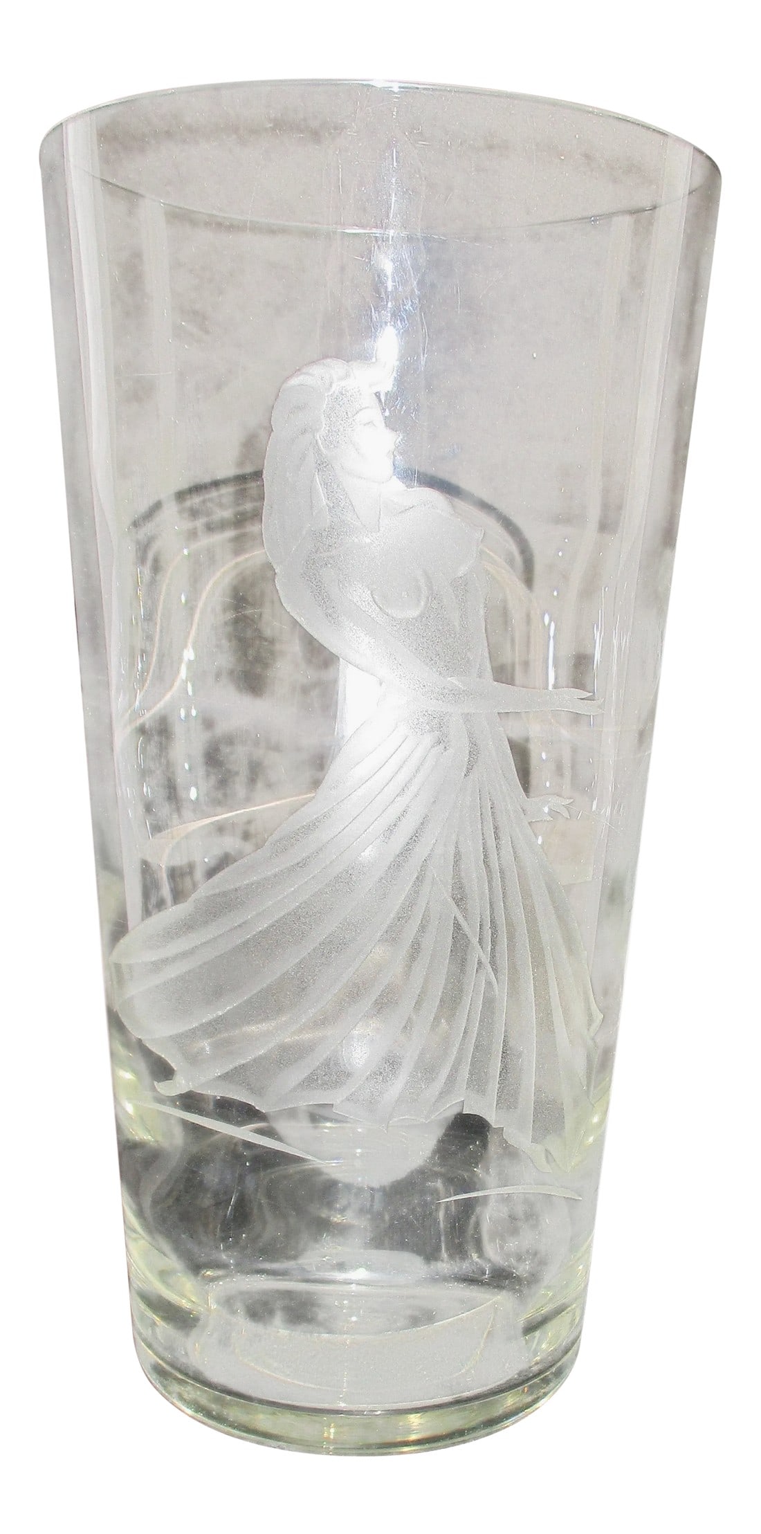 Czechoslovakian Glass Vase With Etched Dancer: Thick walled glass vase with dancer pattern cut design to front. Smooth walls outside , rolling thickness on inside , creates a rolling light play around the walls. Size 12"tall, diameter 6.25".