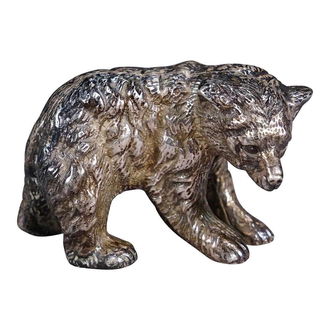 Vintage Sterling Sculpture of a Strolling Bear: Vintage Sterling Sculpture of a Strolling Bear Small sculpture of a strolling bear in sterling silver, cast in Germany in the 1st half of the 20th century. 61,3 gramm, 2.16 oz. A wonderful little show