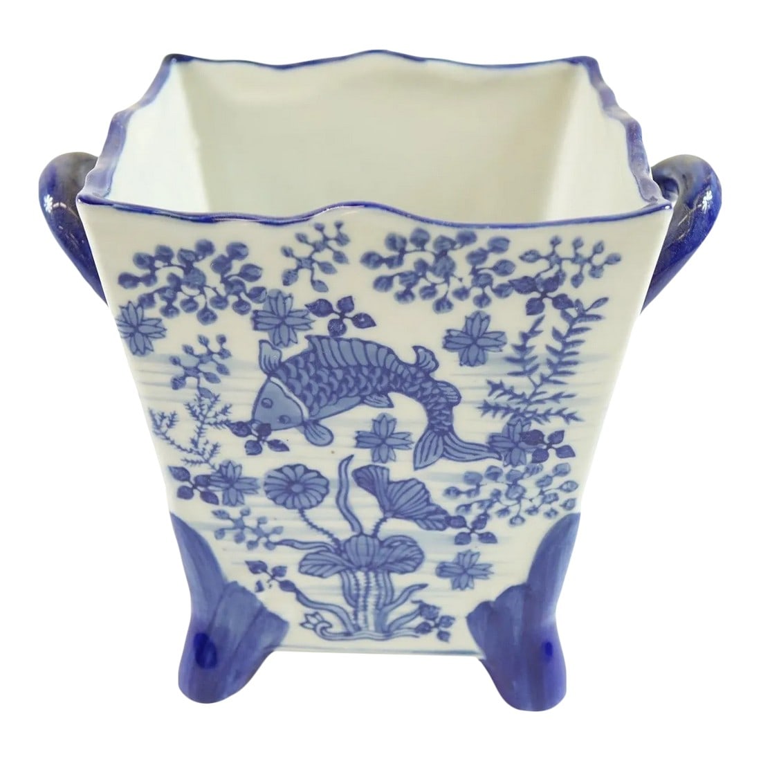 Mid 20th Century Chinese Porcelain Vase: This mid 20th-century Chinese porcelain vase is an exquisite example of traditional blue-and-white porcelain artistry. The vase features a square body with elegantly scalloped edges and rests on four 