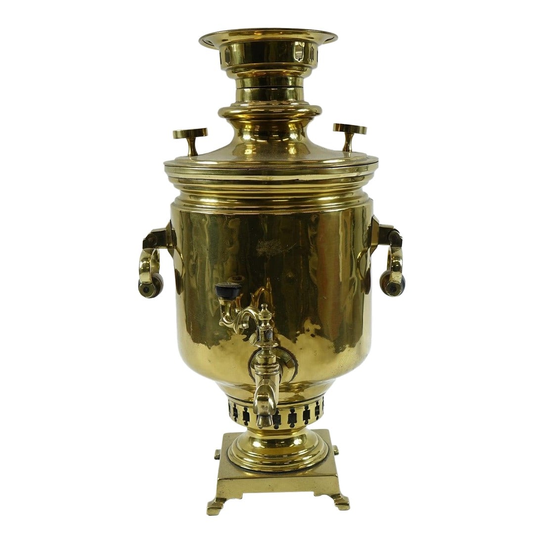 Antique Brass Samovar – 19th Century With Stamps: This exquisite 19th-century Russian samovar is a true testament to fine craftsmanship and historical elegance. Made of solid brass, it features intricate detailing and is adorned with original stamps,