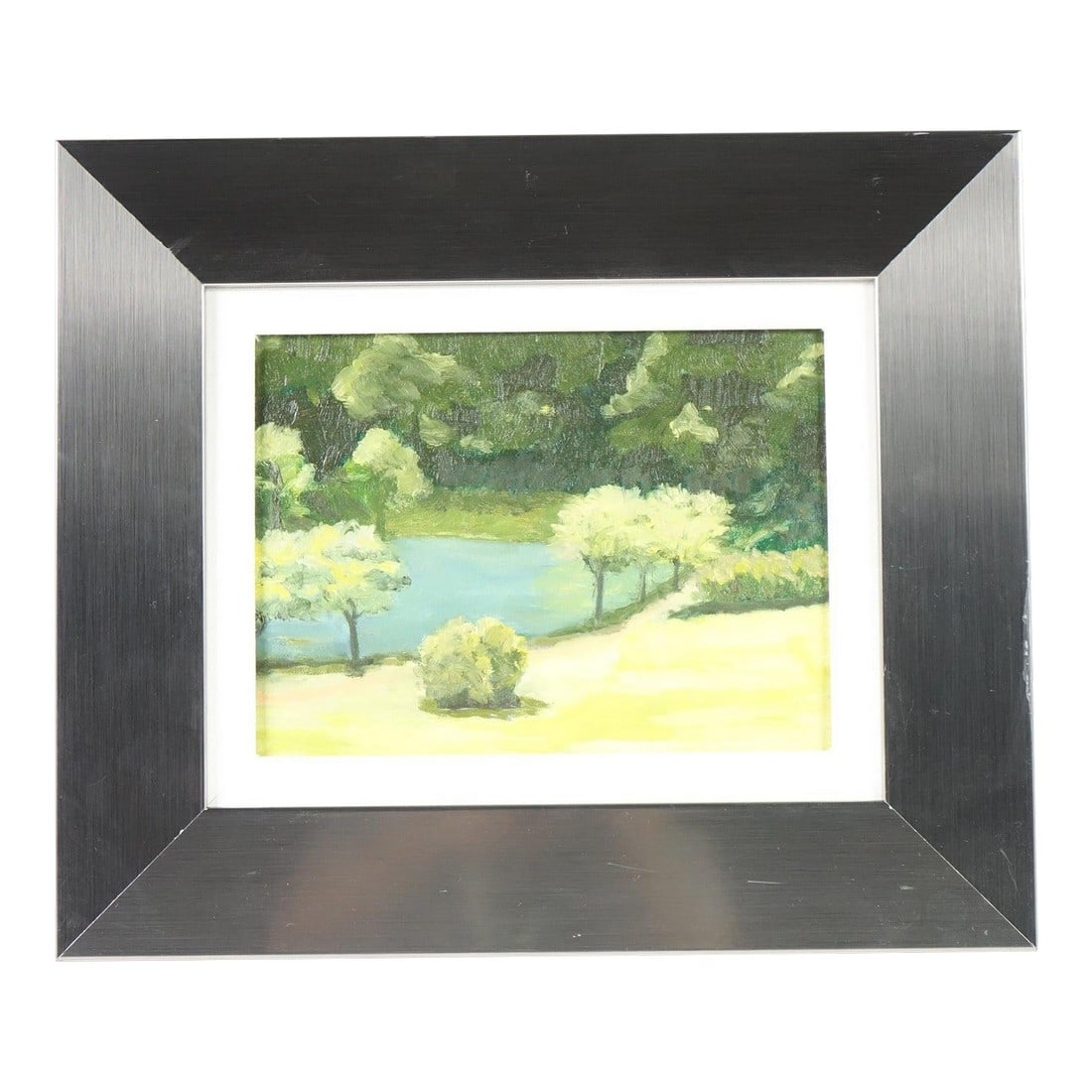 Whispers of Nature - Late 20th Century Oil Painting on Canvas Board Original, Framed: A peaceful and soft-focused original oil painting on canvas board, capturing a lush green landscape with a central pond or stream. Delicate tree forms are depicted in pale yellows and greens, suggesti