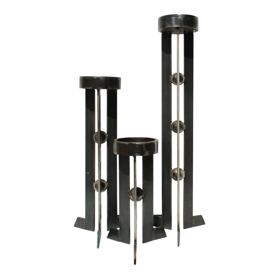 Large Set Welded Steel Candle Holders Circa 80s' - Set of 3: Set of 3 welded steel candle holders. Art Brut Modern Industrial design of tiered set in increments of one, two, and three. The tallest is 18.75" tall, then 13.5" med size, and 8.5" the smallest. All