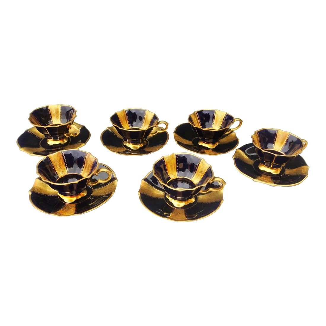 Vintage Lindner Kueps Bavaria Demitasse - a Set of 6: Mid-Century Lindner Kueps Bavaria demitasse set of 6 cups, and saucers. Beautiful deep cobalt color with gold details pattern. Lobed form cups and saucers with gilt handles and matching saucers. Fine