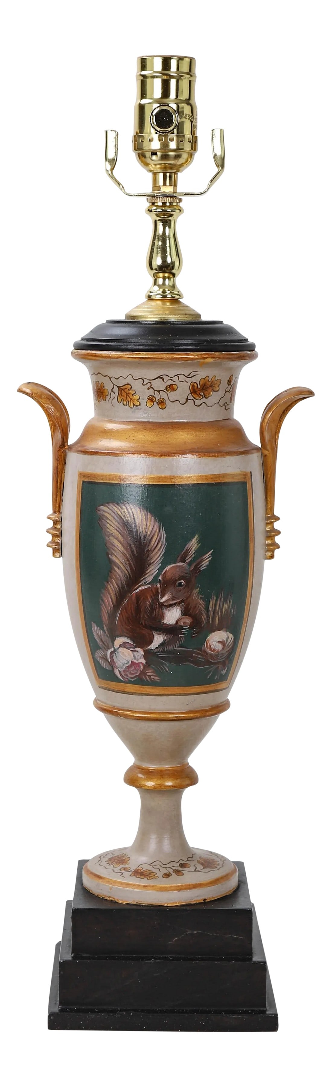 Vintage Cream and Gold Squirrel and Acorns Trophy Cup Lamp: This vintage cream colored trophy cup lamp has leaf handles and a ring of foliage in gold color, with a small painting of a squirrel and acorns on the front and back. Mounted on a marble base.