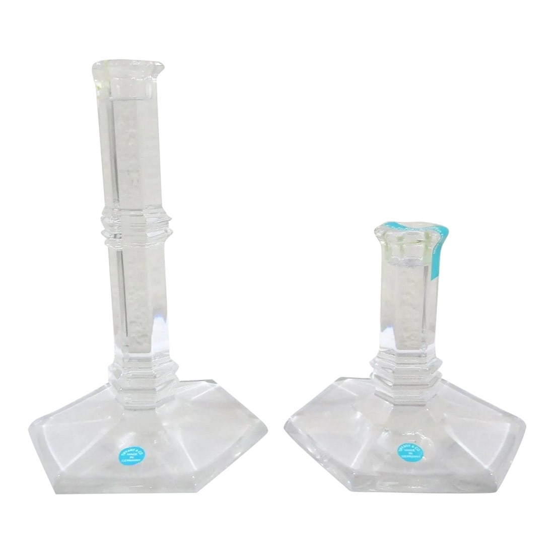 1980s Tiffany & Co. Bamboo Design Crystal Candlestick Holders - a Pair: Eloquent Pair of Tiffany & Co. Bamboo Design Crystal Candlestick Holders With labels. Each signed to base. The taller measures 4 5/8" base diameter, 1 1/4" stem diameter and 8" tall. The shorter