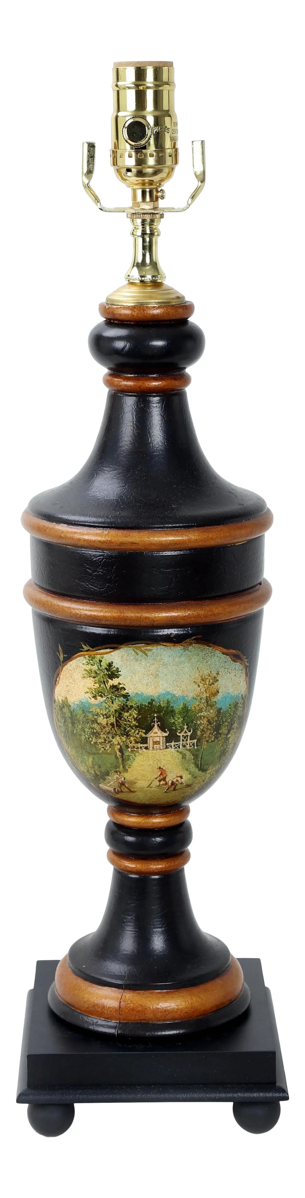 Vintage Black and Gold Color Trophy Lamp With Painted Scene: This vintage trophy cup lamp is handpainted in black with gold accents. Depictions of workers tending to the grounds leading up to a pavilion against a backdrop of blue skies and a verdant forest.