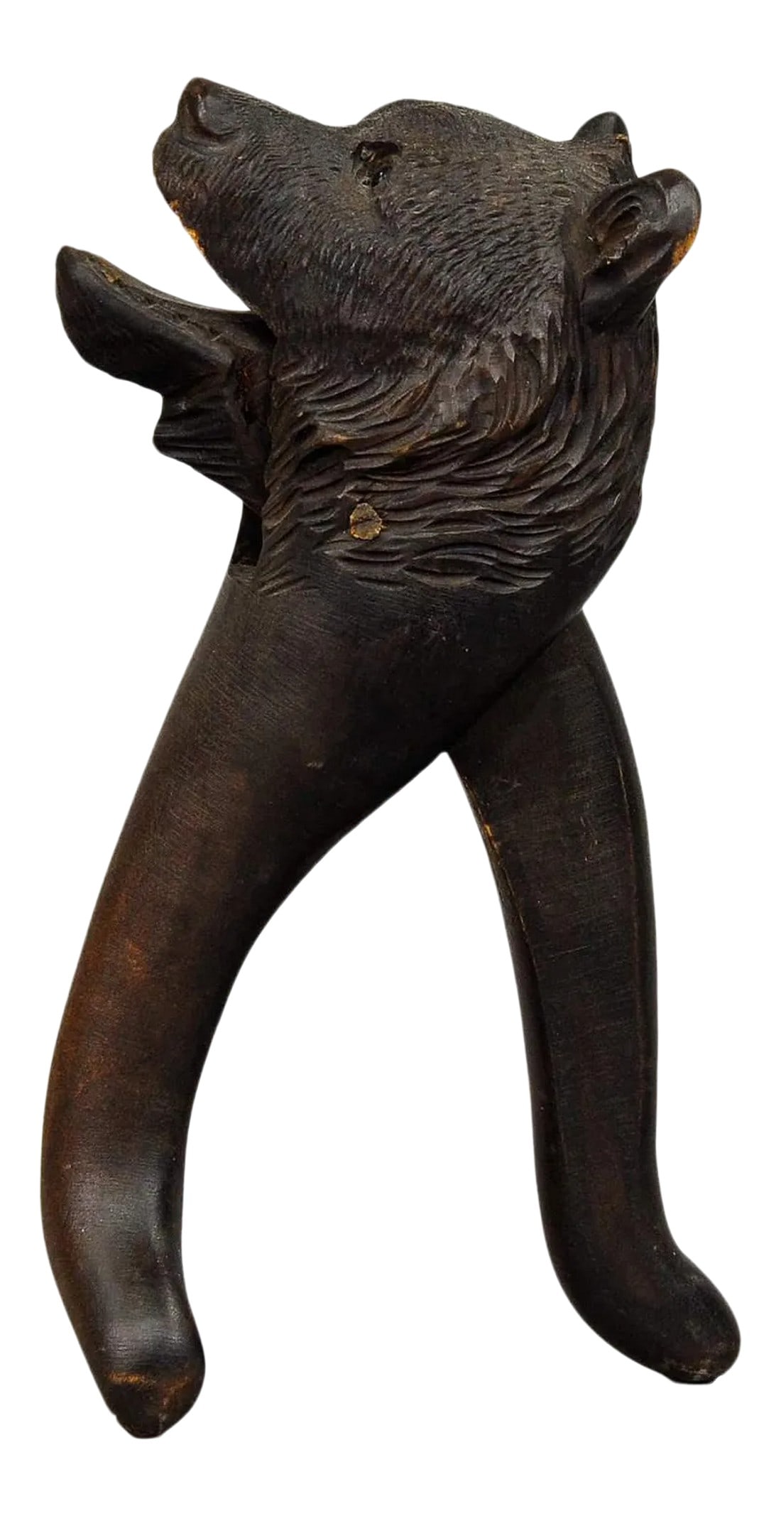 1920s Handcarved Wood Bear Head Nutcracker: Handcarved Wood Bear Head Nutcracker, Swiss - Brienz ca. 1920 A wooden carved nutcracker with a bear head. It is a fine antique Black Forest woodcarving with glass eyes. The nutcracker is executed in 