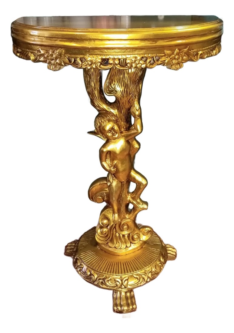 1980s Cherub Gilt Demilune Console Table: Late 20th century highly gilded rococo demilune console table with a cherub figural base, reticulated apron on the table top. Being of recent vintage, the base could be finished in your favorite