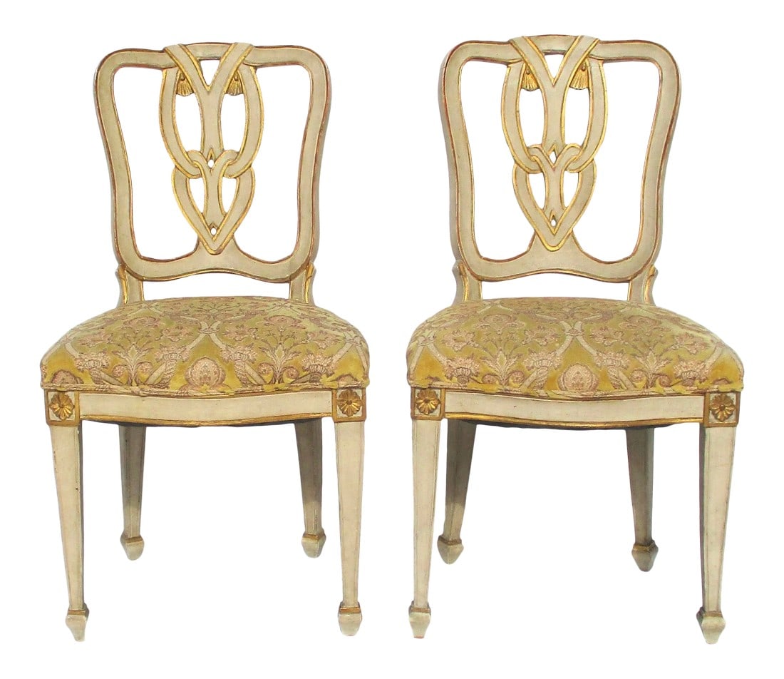 Italian Carved Spade Leg Side Chairs - a Pair of 2: Pair of Italian carved ribbon back side chairs with gilded details and a spaded leg. Upholstered in Scalamandre fabric from the 1980s' commissioned to be used on the Papal Aircraft. Gilt thread with