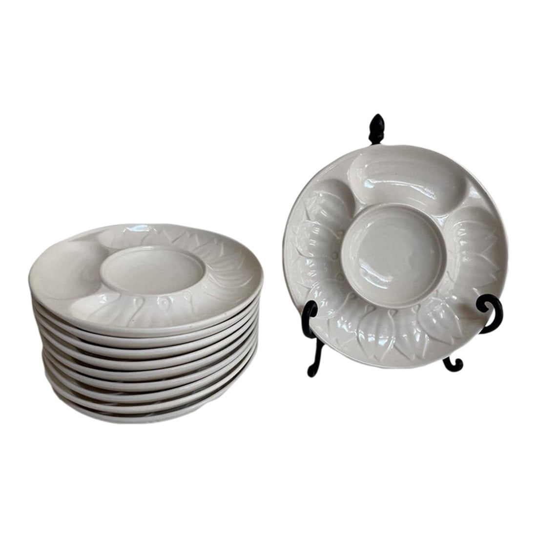 Mid 20th Century Embossed White Artichoke Plates – Czechoslovakia Porcelain- Set of 10: A refined set of ten vintage embossed porcelain plates, each delicately crafted in Czechoslovakia. These 7.5-inch plates feature a sculpted artichoke or leaf motif radiating from the central well,