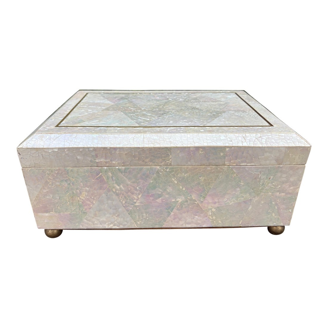 1980s Maitland Smith Mother of Pearl Box: Maitland Smith Mother Of Pearl Box. Offered is a very large decorative box of tessellated mother of pearl in the geometric Art Deco style with brass inlay and feet created by Maitland Smith. This